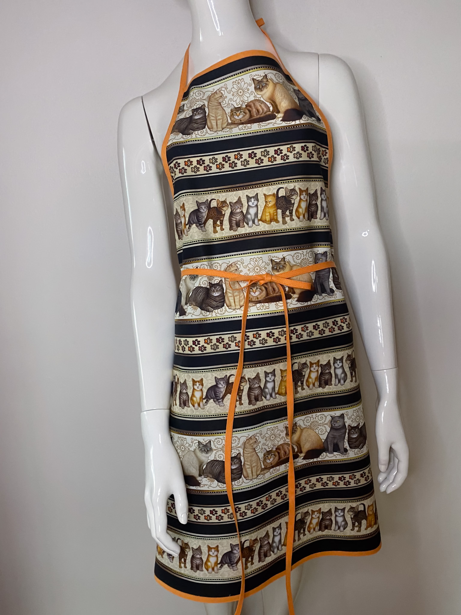 Zástěra s symbolem kočky