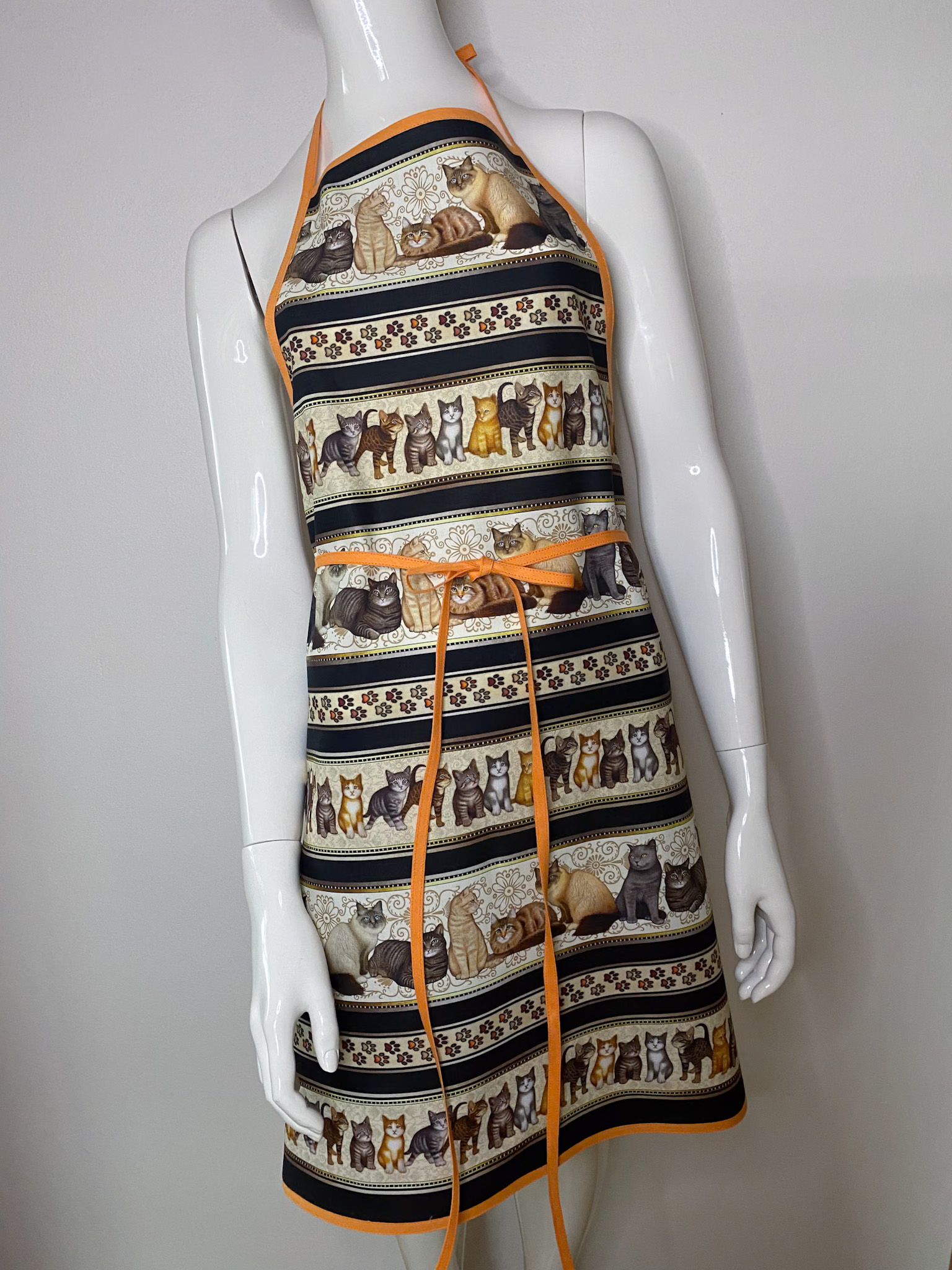 Zástěra s symbolem kočky